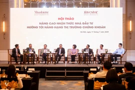 Hội thảo "Nâng cao nhận thức nhà đầu tư hướng tới nâng hạng thị trường chứng khoán." (Ảnh: BTC/Vietnam+)