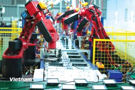 Việc tiếp cận tổng thể giúp giải quyết bài toán cốt lõi là tối đa hóa lợi ích từ nguồn lực công để xây dựng một nền kinh tế độc lập, tự chủ. (Ảnh: Vietnam+)