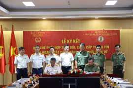 Quy chế phối hợp tập trung vào việc thực hiện trao đổi, cung cấp thông tin về tạm hoãn xuất cảnh thông qua hình thức điện tử. (Ảnh: Vietnam+)