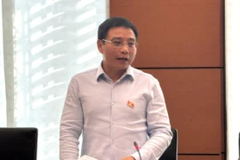 Bộ trưởng Bộ Tài chính Nguyễn Văn Thắng chia sẻ tại tổ nội dung Dự thảo Nghị quyết của Quốc hội về cơ chế, chính sách phát triển kinh tế tư nhân, ngày 15/5. (Ảnh: Vietnam+)