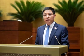 Bộ trưởng Bộ Tài chính Nguyễn Văn Thắng, thừa ủy quyền của Thủ tướng Chính phủ trình bày tờ trình dự án Luật sửa đổi, bổ sung một số điều của Luật Doanh nghiệp. (Ảnh: QH/Vietnam+)