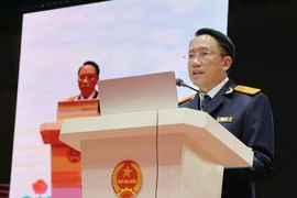 Phó Cục trưởng Cục Thuế ông Mai Sơn chia sẻ thành công của eTax Mobile đến từ việc ứng dụng được hoàn thiện mạnh mẽ theo hướng “một cửa – một điểm chạm”. (Ảnh: Vietnam+)