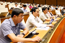Kết quả biểu quyết cho thấy 436 đại biểu tán thành, chiếm tỷ lệ 91,21%. (Ảnh: TTXVN)