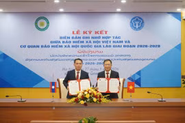 Hai cơ quan ký kết hợp tác giai đoạn 2026-2028 nhằm thúc đẩy cải cách hành chính, hiện đại hóa và chuyển đổi số hệ thống an sinh xã hội hiệu quả hơn. (Ảnh: Vietnam+)