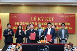 Từ năm 2015, hai ngành đã bắt đầu xây dựng quy chế mẫu và từng bước triển khai trao đổi thông tin điện tử để xác định nghĩa vụ tài chính đối với hộ gia đình, cá nhân. (Ảnh: Vietnam+)