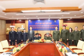 Lễ ký kết Quy chế phối hợp giữa Cục Hải quan (Bộ Tài chính) và Cục Quản lý xuất nhập cảnh (Bộ Công an), ngày 14/1. (Ảnh: HQ/Vietnam+)