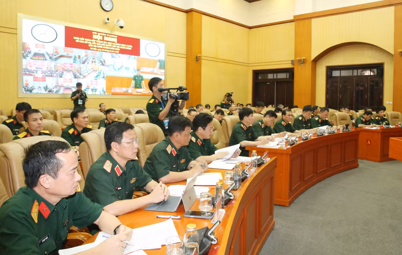 Các đại biểu dự hội nghị tại điểm cầu Bộ Quốc phòng. (Ảnh: PV/Vietnam+)