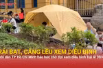 Người dân TP Hồ Chí Minh dựng lều, trải bạt sẵn sàng trắng đêm chờ xem diễu binh