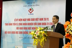 Phó giáo sư Trần Thanh Dương - Viện trưởng Viện Dinh dưỡng Quốc gia phát biểu tại Hội nghị. (Ảnh: PV/Vietnam+)