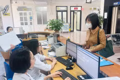 Người dân làm thủ tục khám chữa bệnh tại một sơ sở y tế ở tỉnh Quảng Ninh. (Ảnh: T.G/Vietnam+)