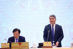 Thứ trưởng Bộ Tư pháp Nguyễn Thanh Tú trả lời các câu hỏi của nhà báo. (Ảnh: Văn Điệp/TTXVN)