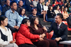 Trải qua lằn ranh sinh tử, Nguyễn Thị Em (áo đỏ) đã lấy lại sức khỏe để tiếp tục ước mơ Đại học. (Ảnh: Viettel Telecom)