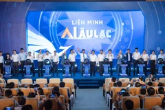 Hơn 20 cơ quan nhà nước, doanh nghiệp, trường đại học đã “bắt tay” thành lập Liên minh Trí tuệ nhân tạo đầu tiên của Việt Nam. (Ảnh: PV/Vietnam+)