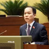 Bộ trưởng Bộ Tư pháp Hoàng Thanh Tùng phát biểu giải trình, làm rõ một số vấn đề đại biểu Quốc hội nêu. (Ảnh: An Đăng/TTXVN)
