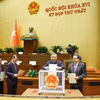 Tổng Bí thư, Chủ tịch nước Tô Lâm cùng các đồng chí lãnh đạo, đại biểu bỏ phiếu phê chuẩn Thẩm phán, Phó Thủ tướng Chính phủ, Bộ trưởng và thành viên khác của Chính phủ. (Ảnh: Doãn Tấn/TTXVN)