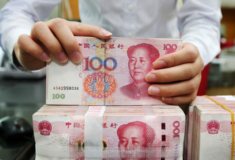 Đồng 100 nhân dân tệ của Trung Quốc. (Ảnh: AFP/TTXVN)