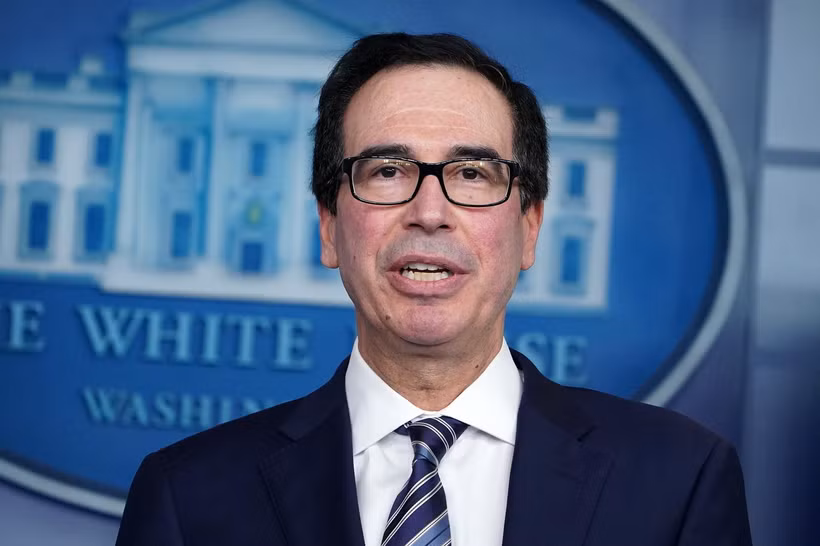 Bộ trưởng Tài chính Mỹ Steven Mnuchin phát biểu trong cuộc họp báo tại Nhà Trắng. (Ảnh: AFP/TTXVN)