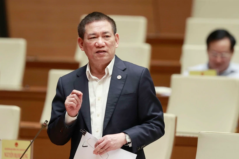 Bộ trưởng Bộ Tài chính Hồ Đức Phớc phát biểu tại phiên họp Hội nghị đại biểu Quốc hội hoạt động chuyên trách. (Ảnh: Doãn Tấn/TTXVN)