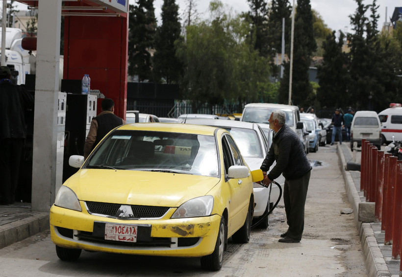 Một trạm bơm xăng ở Damascus, Syria. (Ảnh: AFP/TTXVN)