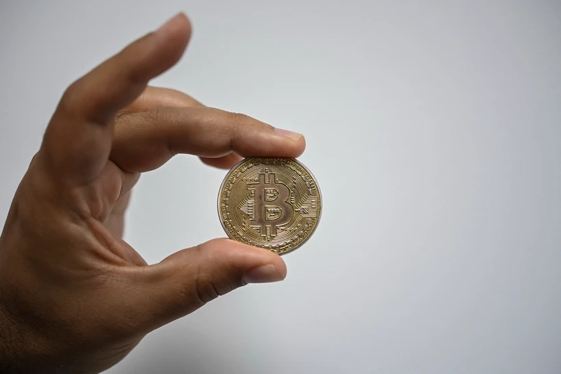 Đồng tiền kỹ thuật số Bitcoin. (Ảnh: AFP/TTXVN)