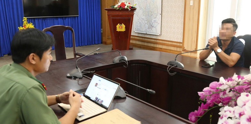 Ông Đ.V.H tại cơ quan Công an. (Nguồn: TTXVN) 