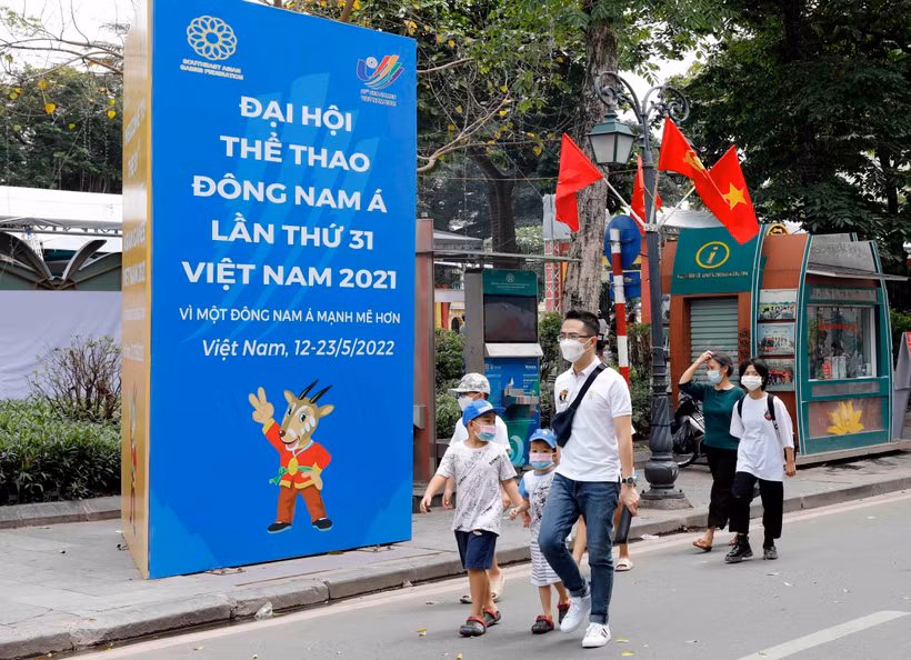 Trong ảnh: Biểu ngữ chào SEA Games 31 trên phố Lê Thạch. Ảnh: Trần Việt - TTXVN 