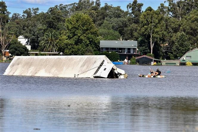 Lũ lụt do ảnh hưởng La Nina tại Windsor, ngoại ô Sydney, Australia, ngày 24/3/2021. (Ảnh: AFP/TTXVN)