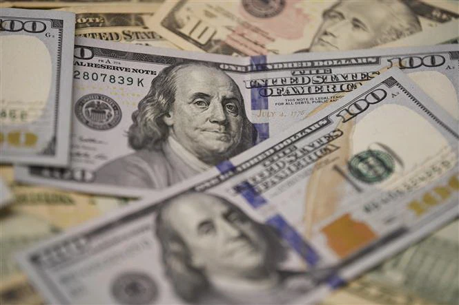 Đồng USD tại một ngân hàng ở Washington, DC, Mỹ. (Nguồn: THX/TTXVN) 