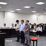 Ba bị cáo tại phiên tòa. (Ảnh: Kim Anh/TTXVN)