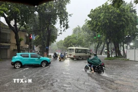 Hà Nội ngập khắp nơi. (Ảnh: Lâm Khánh/TTXVN)