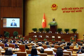 Chủ tịch nước Lương Cường trình bày Báo cáo tổng kết công tác nhiệm kỳ 2021-2026 của Chủ tịch nước. (Ảnh: Phạm Kiên/TTXVN)