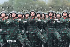 Khối nữ Bộ đội thông tin tham gia hợp luyện. (Ảnh: Trọng Đức/TTXVN)