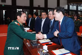 Đại tướng Nguyễn Tân Cương, Ủy viên Trung ương Đảng, Tổng Tham mưu trưởng, Thứ trưởng Bộ Quốc phòng cùng đại biểu dự hội nghị. (Ảnh: Trọng Đức/TTXVN)