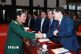 Đại tướng Nguyễn Tân Cương, Ủy viên Trung ương Đảng, Tổng Tham mưu trưởng, Thứ trưởng Bộ Quốc phòng cùng đại biểu dự hội nghị. (Ảnh: Trọng Đức/TTXVN)