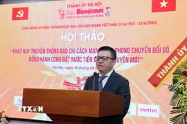 Nhà báo Lê Quốc Minh, Ủy viên Trung ương Đảng, Tổng Biên tập Báo Nhân Dân, Chủ tịch Hội Nhà báo Việt Nam phát biểu tại hội thảo. (Ảnh: Quốc Lũy/TTXVN)