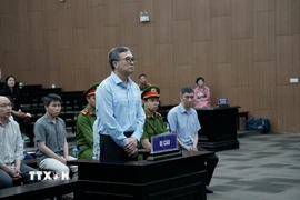 Cựu Thứ trưởng Bộ Công Thương Hoàng Quốc Vượng tại phiên tòa. (Ảnh: Kim Anh/TTXVN)