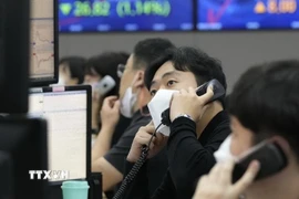Thị trường chứng khoán châu Á đã tăng lên mức cao nhất trong sáu tuần vào phiên ngày 26/12. (Ảnh: AFP/TTXVN)
