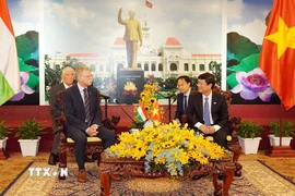 Phó Bí thư Thành ủy, Chủ tịch Hội đồng Nhân dân Thành phố Hồ Chí Minh Võ Văn Minh tiếp Chủ tịch Quốc hội Hungary Kover Laszlo. (Ảnh: Trung Tuyến/TTXVN)