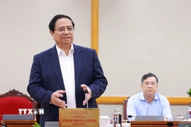 Thủ tướng Phạm Minh Chính làm việc với Ban Thường vụ Tỉnh ủy An Giang. (Ảnh: Dương Giang/TTXVN)