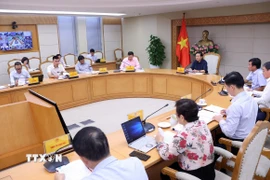 Cuộc họp về dự án Nghị quyết liên quan đến khoáng sản và dự án Luật Sửa đổi, bổ sung một số điều của Luật Địa chất và khoáng sản. (Ảnh: Văn Điệp/TTXVN)