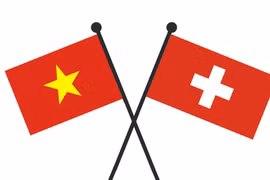 Quốc kỳ Việt Nam và Thụy Sĩ. (Nguồn: Vietnam+)