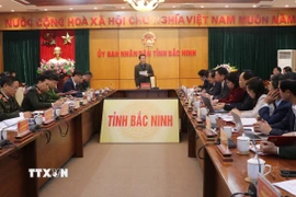 Bộ trưởng Bộ Công an Lương Tam Quang làm việc với lãnh đạo tỉnh Bắc Ninh về việc thực hiện dự án Cảng Hàng không Quốc tế Gia Bình. (Ảnh: Thanh Thương/TTXVN)