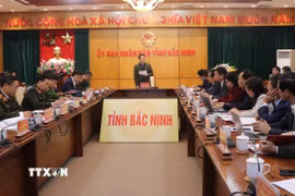 Bộ trưởng Bộ Công an Lương Tam Quang làm việc với lãnh đạo tỉnh Bắc Ninh về việc thực hiện dự án Cảng Hàng không Quốc tế Gia Bình. (Ảnh: Thanh Thương/TTXVN)