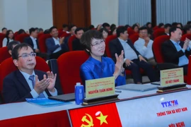 Tổng Giám đốc Vũ Việt Trang và các đại biểu tham dự Hội nghị. (Ảnh: Phan Phương/TTXVN)