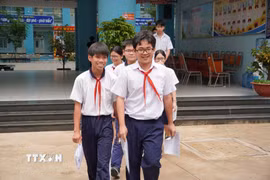Thí sinh tại điểm thi Trường THCS Dương Bá Trạc, phường Chánh Hưng, Thành phố Hồ Chí Minh. (Ảnh: Trung Tuyến/TTXVN)