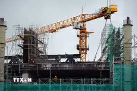 Thi công công trình hạ tầng kỹ thuật phục vụ Hội nghị APEC 2027 trên địa bàn đặc khu Phú Quốc (An Giang). (Ảnh: Lê Huy Hải/TTXVN)