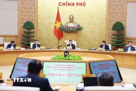 Thủ tướng chủ trì Phiên họp thứ 8 của Ban Chỉ đạo tinh gọn bộ máy của Chính phủ. (Ảnh: Dương Giang/TTXVN)