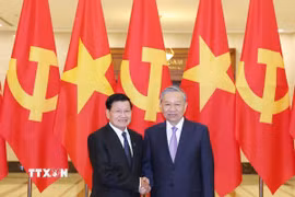 Tổng Bí thư Tô Lâm và Tổng Bí thư, Chủ tịch nước Lào Thongloun Sisoulith. (Ảnh: Thống Nhất/TTXVN)