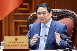 Thủ tướng Phạm Minh Chính chủ trì họp Thường trực Chính phủ chuẩn bị đàm phán thương mại với Hoa Kỳ. (Ảnh: Dương Giang/TTXVN)