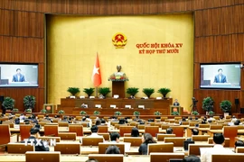 Bộ trưởng Bộ Xây dựng Trần Hồng Minh giải trình, làm rõ một số vấn đề đại biểu Quốc hội nêu. (Ảnh: Doãn Tấn/TTXVN)